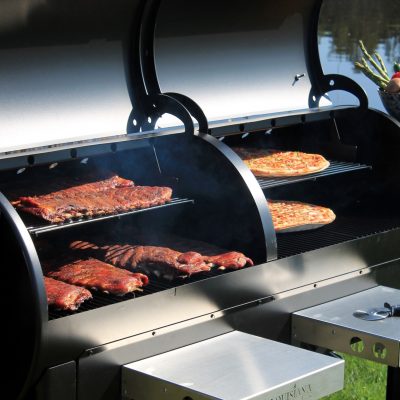 Meat and pizza on pellet grill