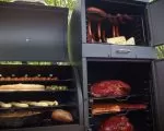 Thumnbail of Large pellet grill showing all types of food that can be cooked on it